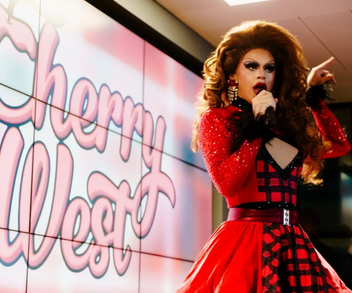 Cherry West Drag Queen Performing at a Scottish Government event, performance Curated by The Association of Exiled Scots